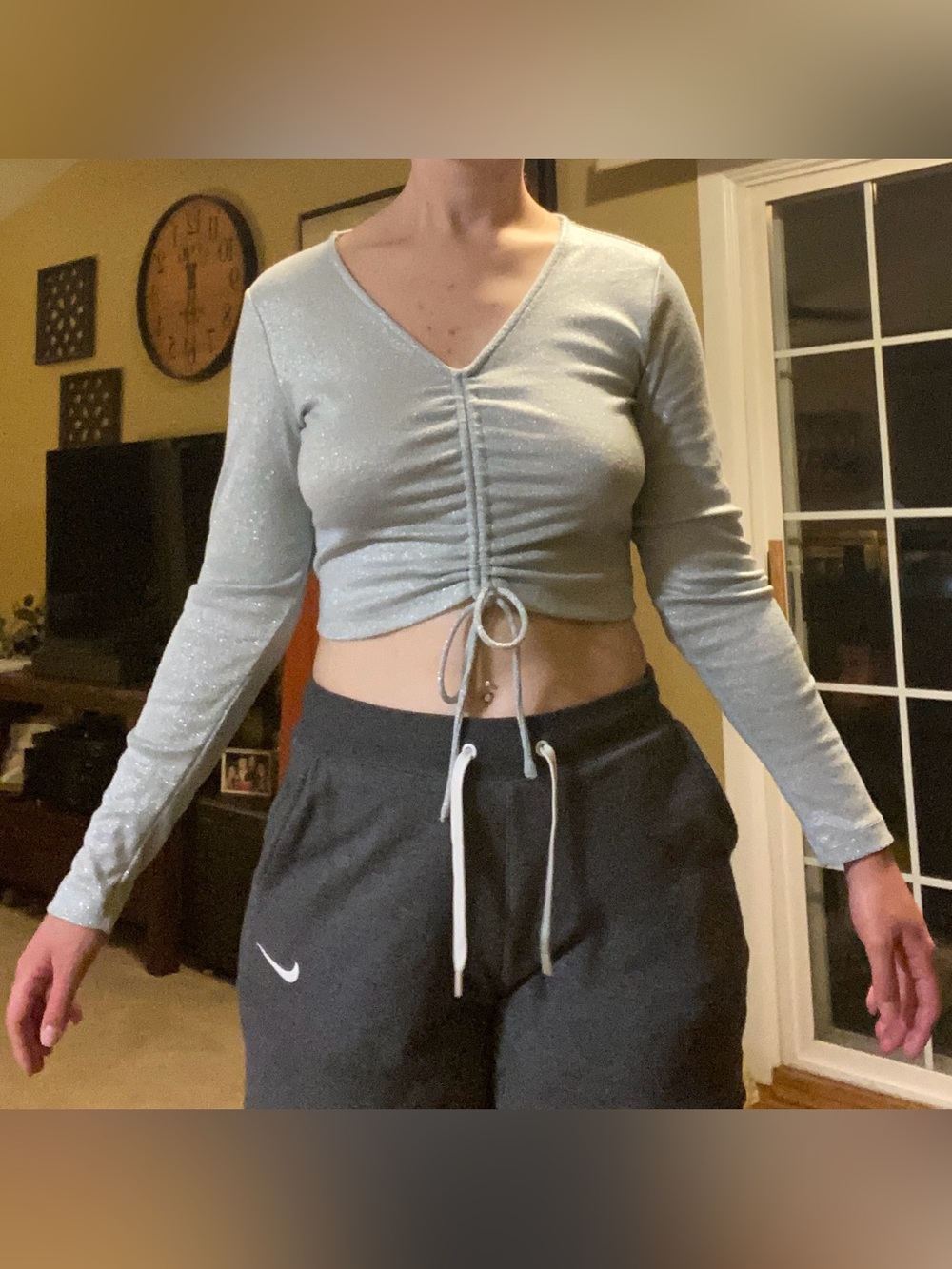 Sparkly light blue long sleeve crop top with adjustable front bow